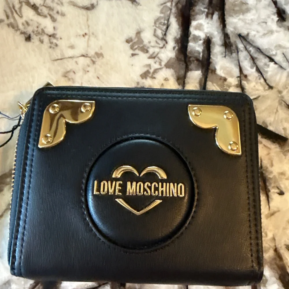 Love Moschino large bifold wallet. NWT. Retail 200‎